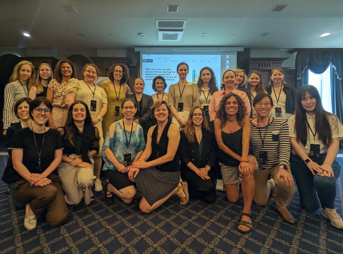 A group photo of women in experimental finance.